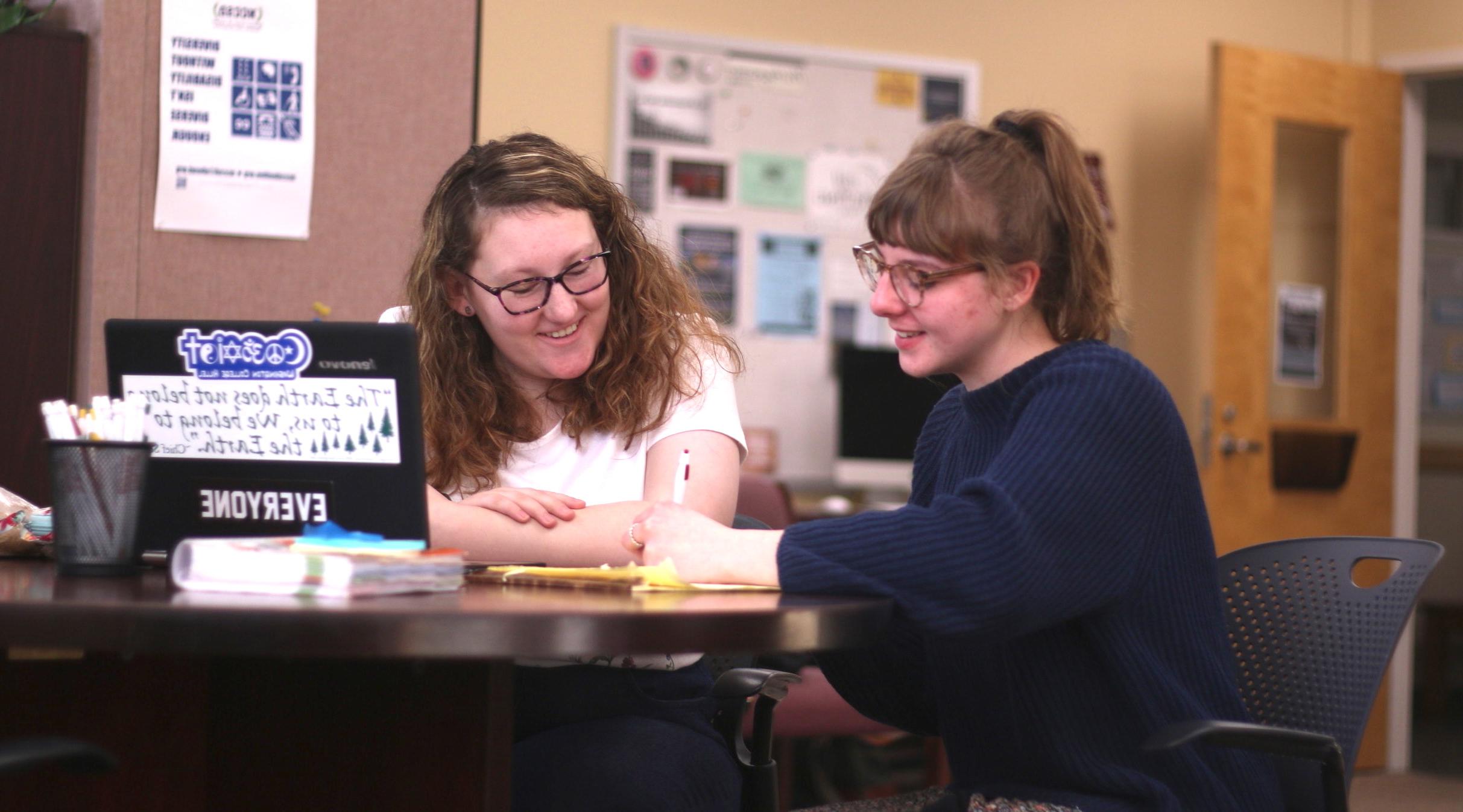 Two students in the writing center